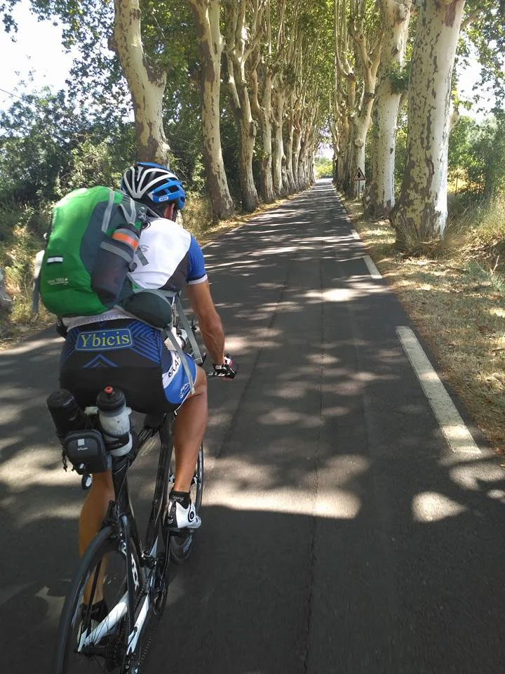 One of the cyclists on a cyclingn road