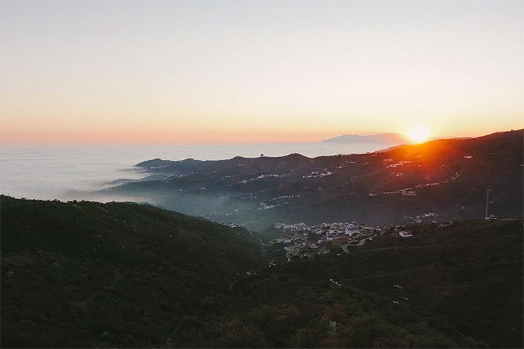 A sunset view from the top of the Sierra de Tejeda, captured along the cycling route