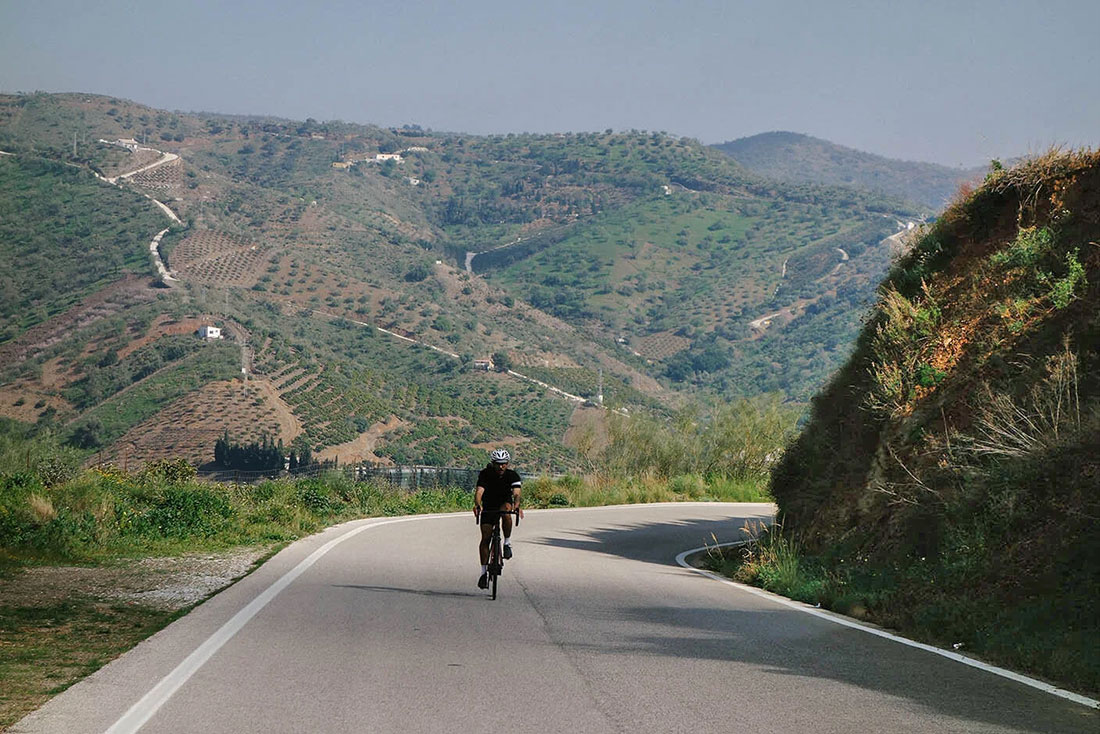Cyclist on the mountain road on the cycle tour to Axarquia