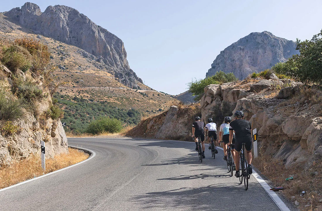 Cyclists on the road during the cycle jorney to Sierra de Tejeda