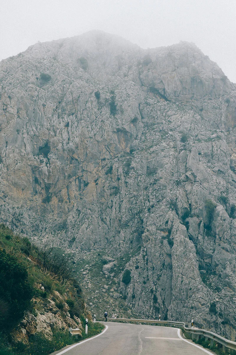 Passing the rock formations of Zafarraya during a bikepacking route from Málaga